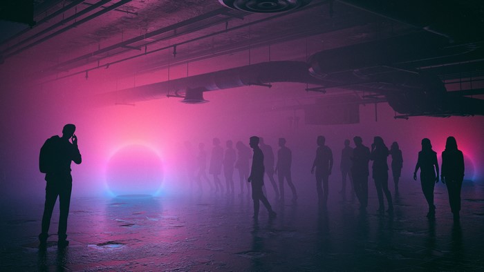 People in a foggy room with a glowing circle