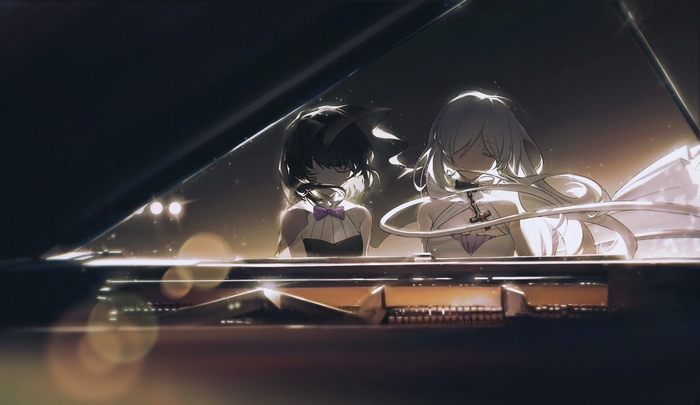 Two girls playing piano