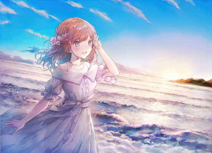 Girl with short brown hair in a dress by the sea