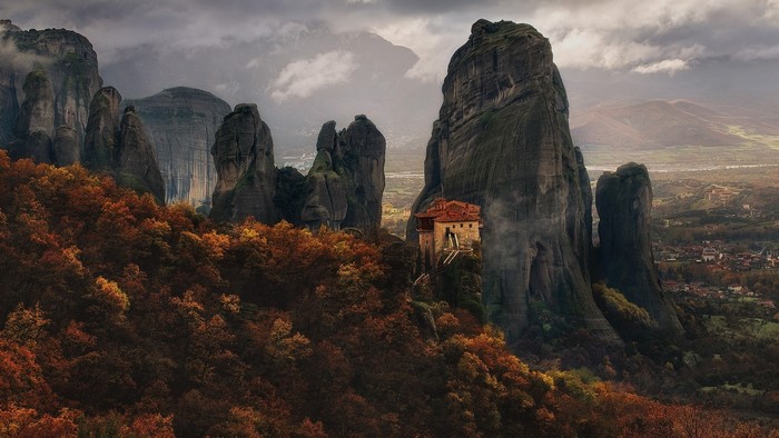 Monastery on a rock formation in Meteora, Greece during fall