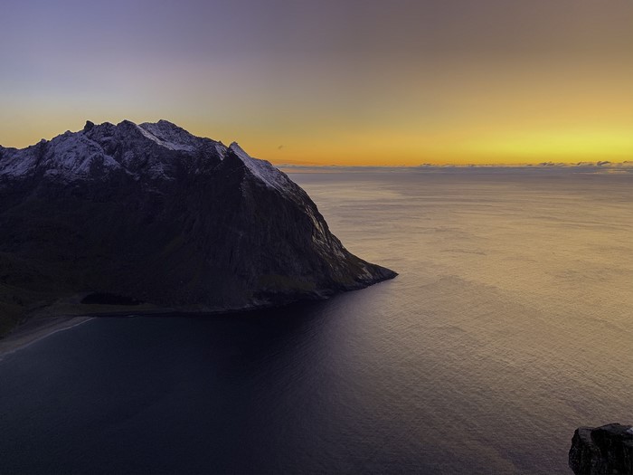 Mountain and ocean at sunset in Norway