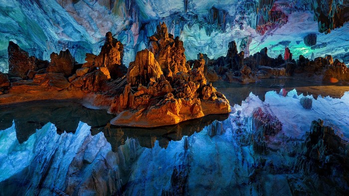 Reed Flute Cave in Guilin, China with rock formations and reflections