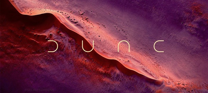 Dune logo over desert landscape