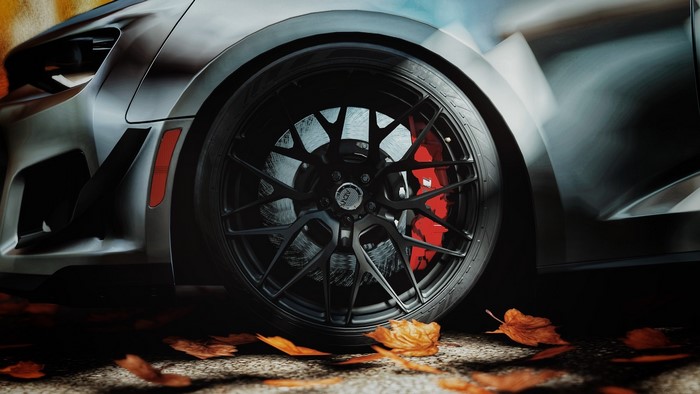 Chevrolet Camaro ZL1 1LE with black rims in fall