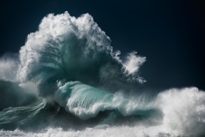 Luke Shadbolt's powerful wave crashing against a dark sky