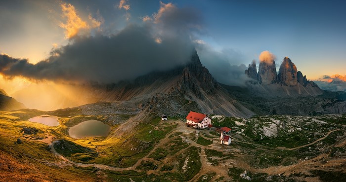 Tre Cime di Lavaredo, Dolomites at sunset with lakes and cabins
