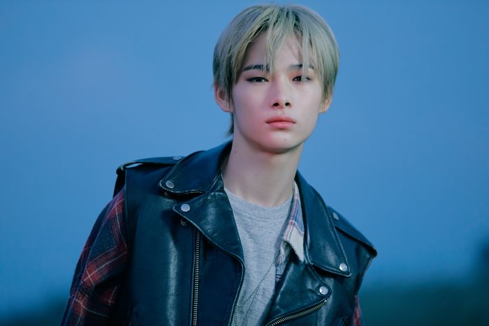 Ni-Ki from ENHYPEN in a leather jacket