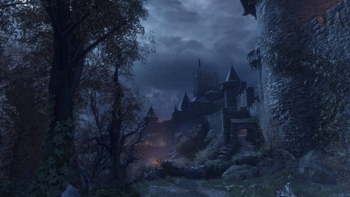 Castle and trees at night in A Plague Tale Innocence