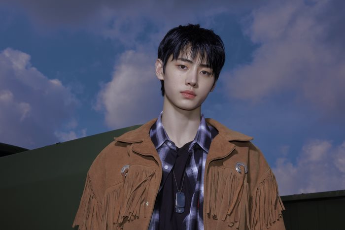 Sunghoon ENHYPEN in a brown fringed jacket
