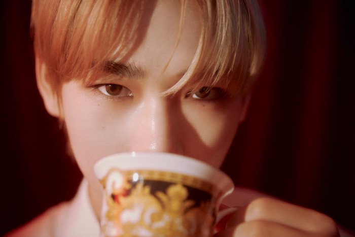 Ni-Ki ENHYPEN drinking from a teacup