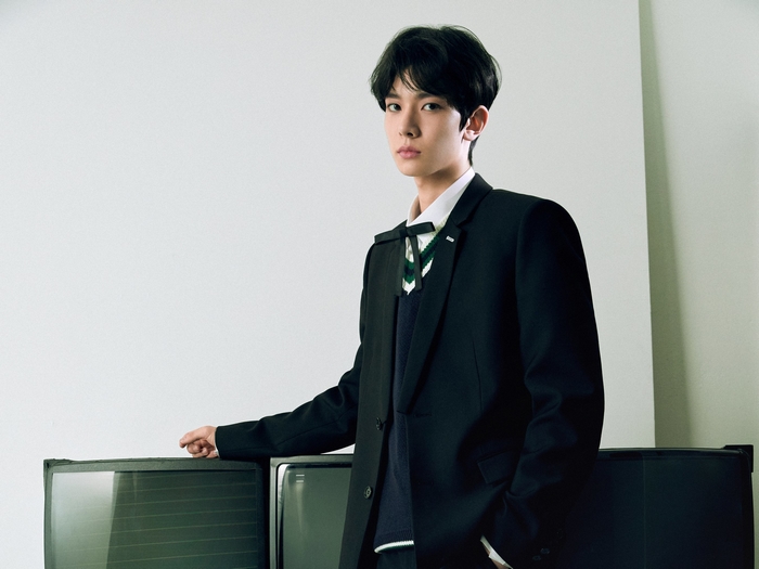 Heeseung ENHYPEN in a black suit