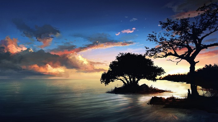Sunset over the sea with trees on the shore