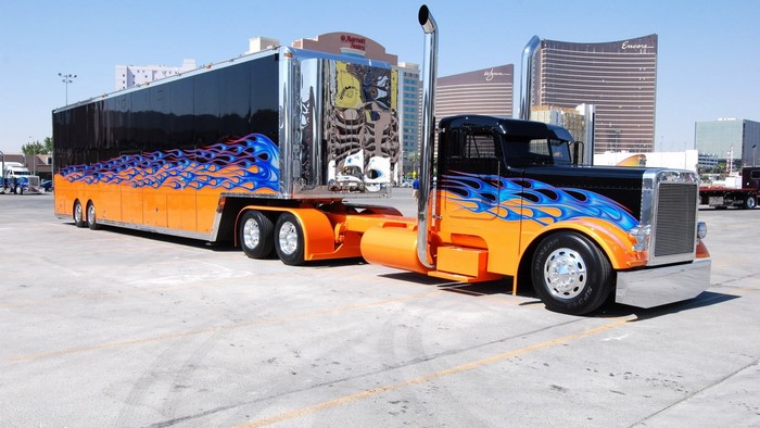Custom flame-painted semi-truck and trailer