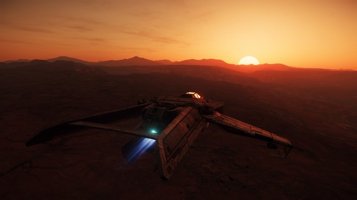 F7C Hornet spaceship flying over a desert planet at sunset