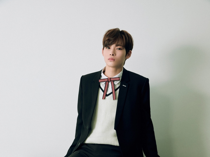ENHYPEN's Sunoo in a black blazer and bow tie