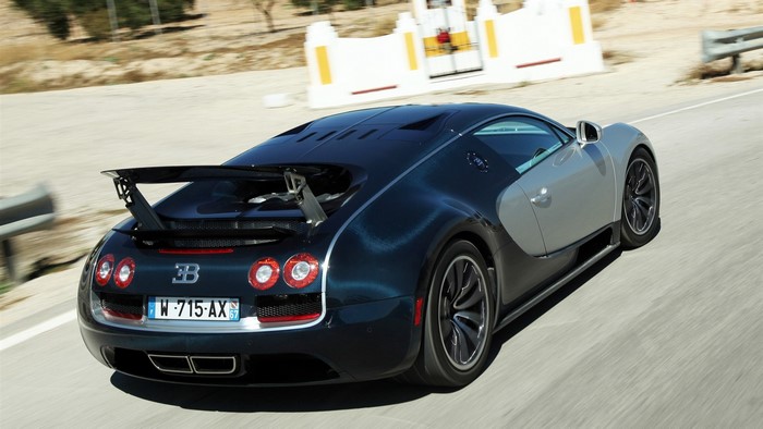 Bugatti Veyron driving on a road