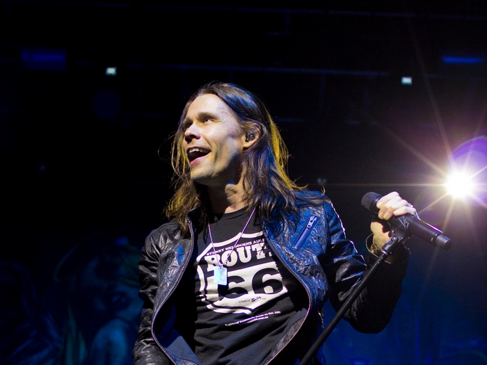 Myles Kennedy performs on stage