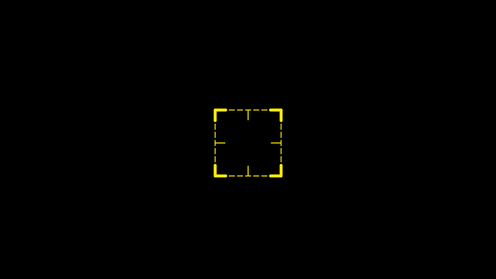 Yellow target reticle on black background