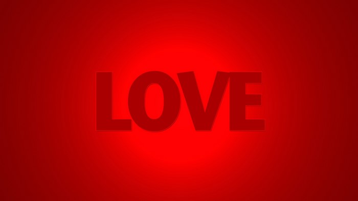 The word LOVE in bold red letters on a red background