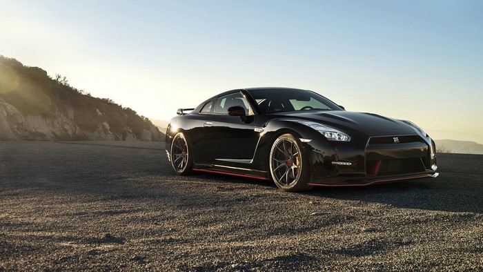 Black Nissan GT-R on a rocky landscape