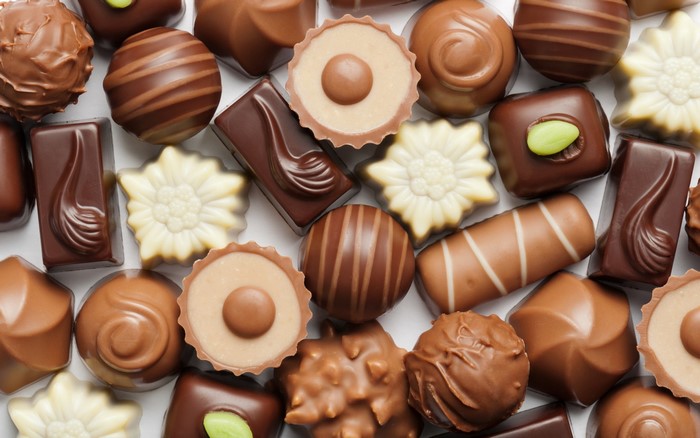 Assortment of chocolates on a white background