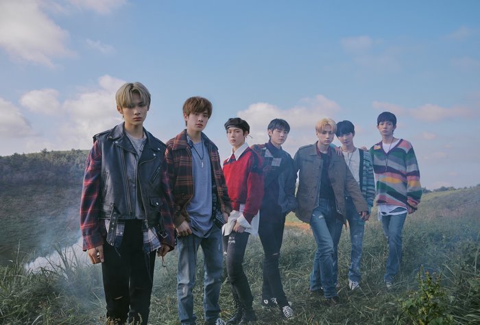 ENHYPEN members in a field