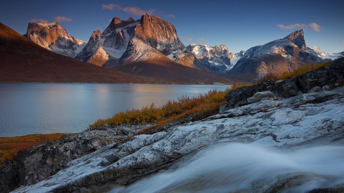 Mountains and lake in Tasermiut Fjord, Greenland during fall