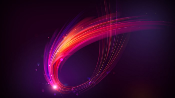 Abstract colorful light swirls on dark background