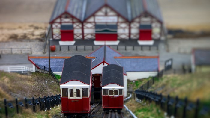 Funicular cars at a building with tilt shift effect