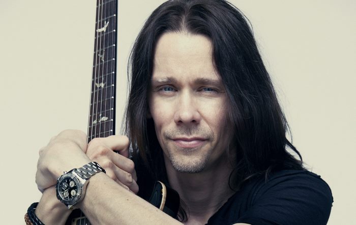 Myles Kennedy with a guitar