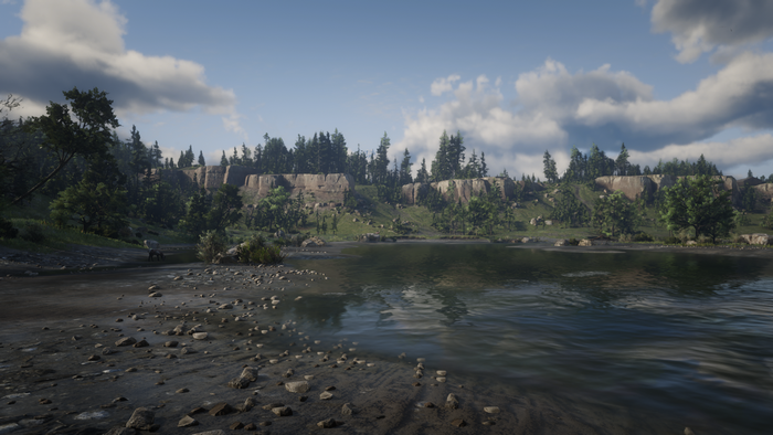 Red Dead Redemption 2 landscape with lake and cliffs