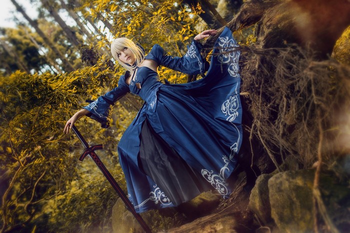 Saber Alter from Fate Series in a blue dress with a sword