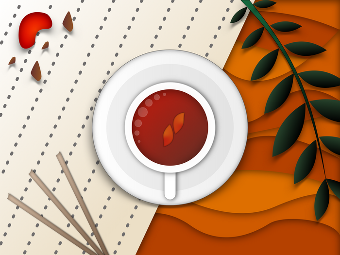 Overhead view of a cup of tea with leaves