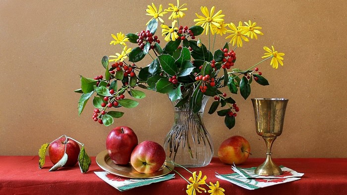 Still life with apples, flowers, and a goblet