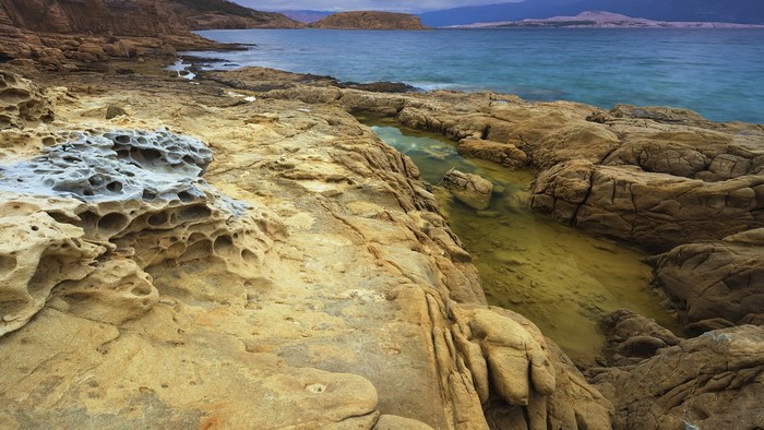Rocky shoreline with clear sea in Croatia