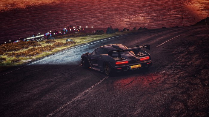 McLaren Senna driving on a road at sunset in Forza Horizon 4