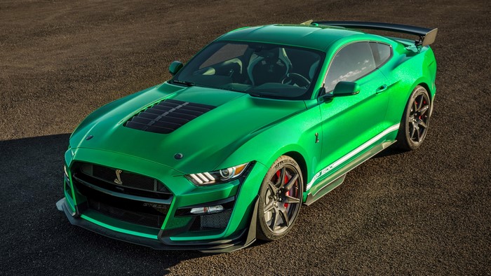 Green Ford Shelby GT500 parked on asphalt