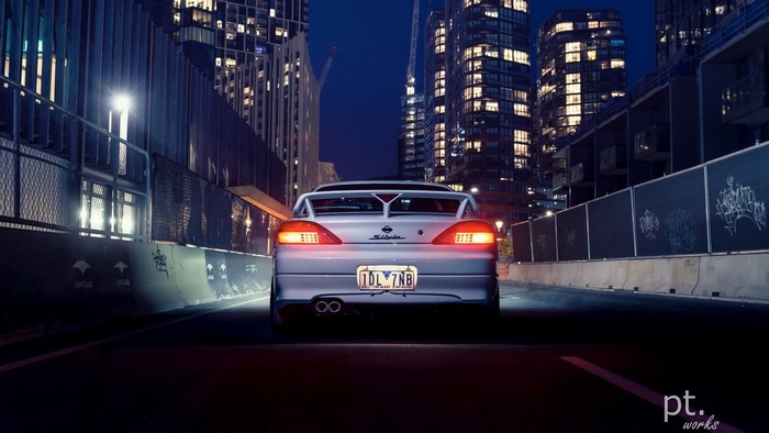 Nissan Silvia S15 driving at night in a city