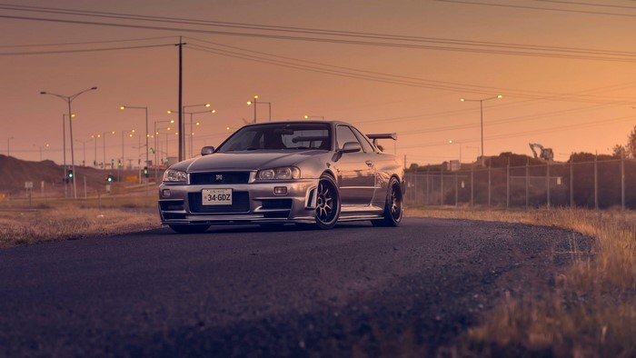 Silver Nissan Skyline GT-R R34 at Sunset