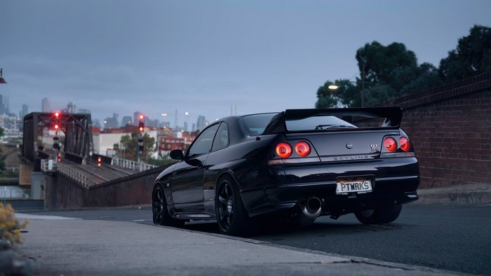 Black Nissan Skyline GT-R R33 with PTWRKS plate