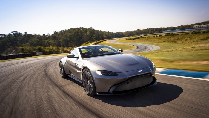 Silver Aston Martin Vantage on a Race Track