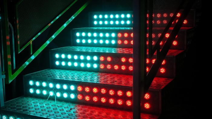 Stairs with alternating red and blue LED lights