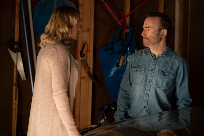 Bob Odenkirk and Connie Nielsen in a garage