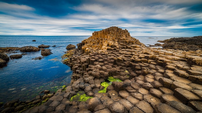 Giant's Causeway landscape with hexagonal basalt columns and the sea
