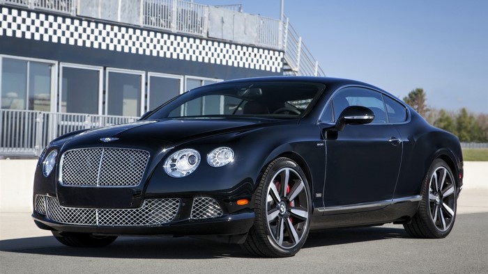 Black Bentley Continental GT on a Racetrack