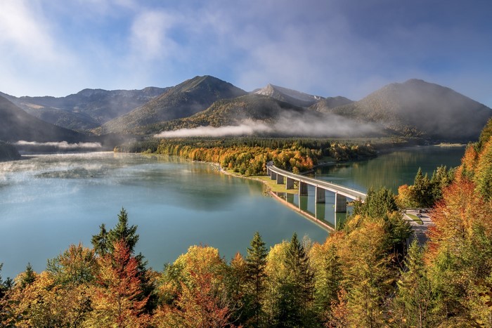 Bridge over Lake Sylvenstein in Bavaria, Germany during autumn