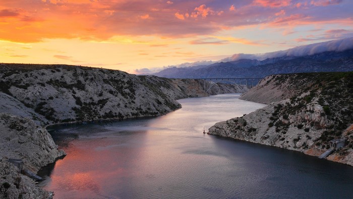 Bridge over a river at sunset in Croatia