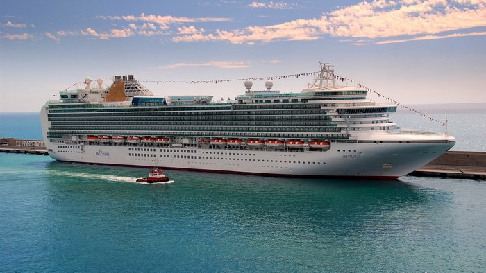 P&O Cruises Ventura cruise ship with tugboat