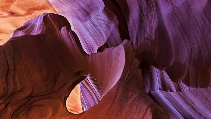 Colorful sandstone formations in a slot canyon