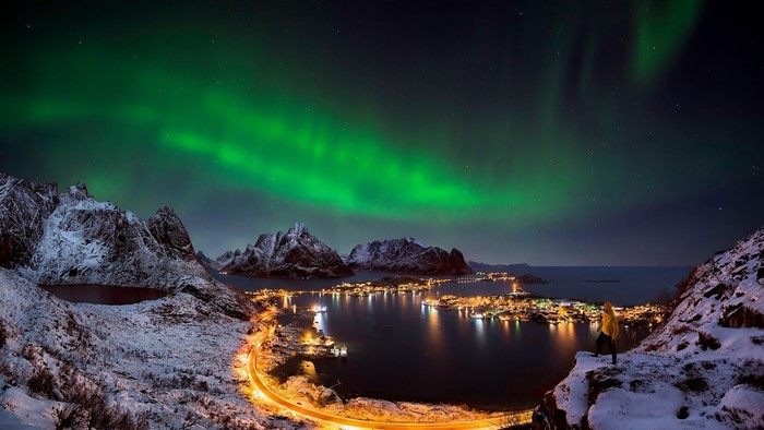 Aurora Borealis over a Norwegian village at night
